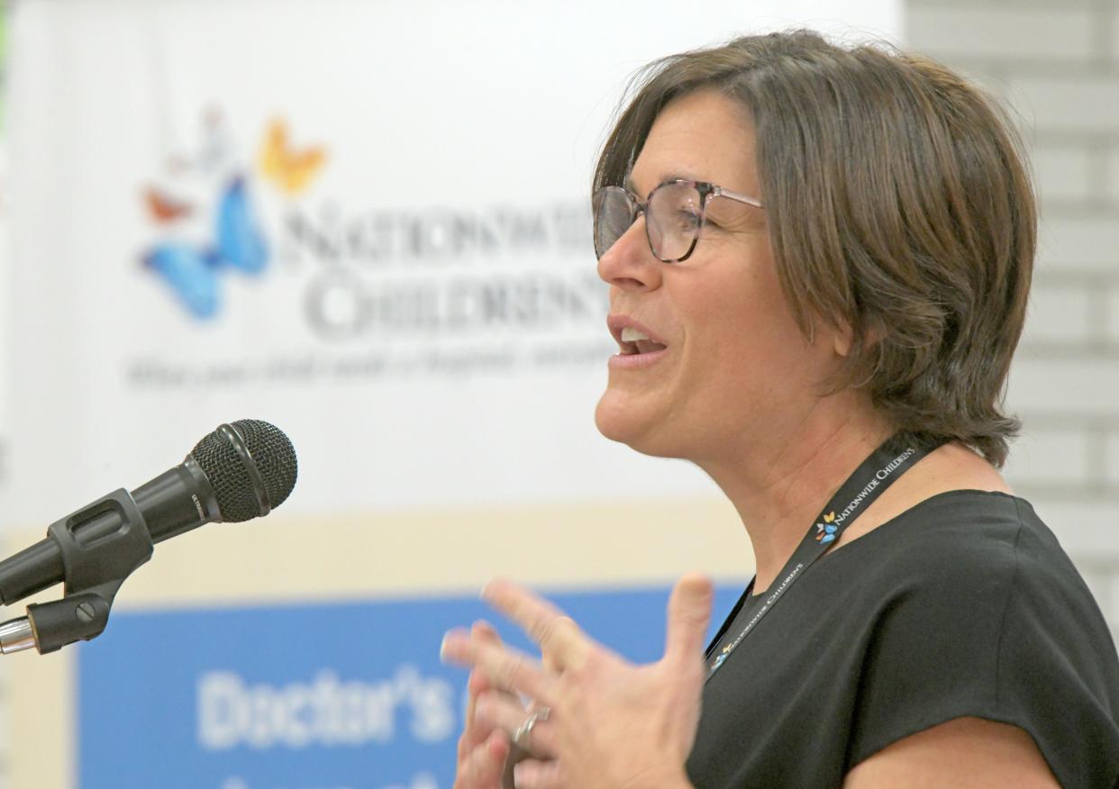 Dr. Sara M. Bode speaks during the open house for the new Nationwide Children's Hospital school-based health center for Shelby City Schools.