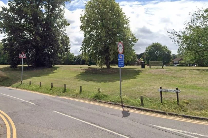 Chipstead Lane in Sevenoaks at junction with Witches Lane and Bullfinch Lane - a rural looking cross roads with a village green to the side, and a width restriction sign