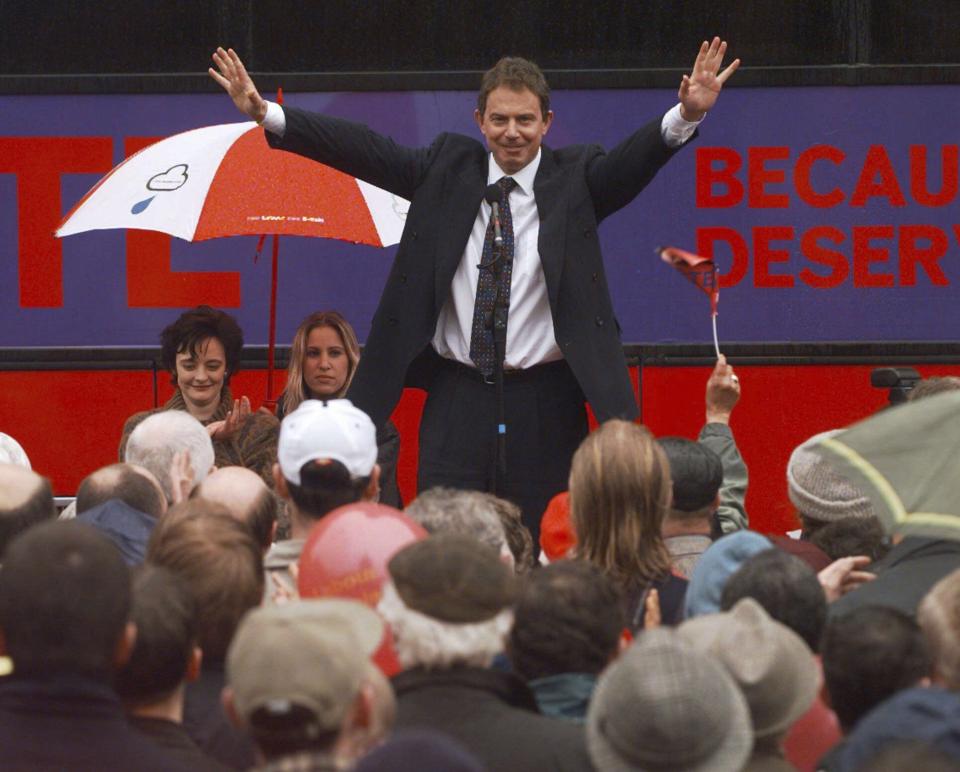 FILE - British Labour Party leader Tony Blair acknowledges applause during his speech to supporters at a campaign stop at Manchester's Albert Square, Manchester, England, April 26, 1997. The upcoming general election on July 4, 2024, is widely expected to lead to a change of government for the first time in 14 years. In 1997, the Labour Party had been out of power for longer than it has been now - 18 years - and it was quite a turnaround when Labour, under the leadership of the youthful Tony Blair, won the May 1, 1997 general election by a landslide majority of 179 seats. (AP Photo/Jacqueline Arzt, File)