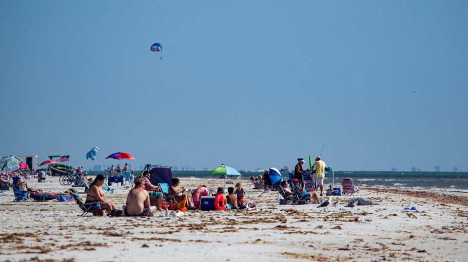 Visitors enjoy Bowditch Point Park onFort Myers Beach on Monday, Feb. 26, 2024. The Army Corp of Engineers started Lake Okeechobee releases on Feb. 17 due to high lake levels and continued El Nino conditions.