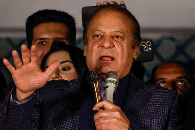 FILE PHOTO: Supporters of Former Prime Minister of Pakistan Nawaz Sharif cheer as they gather at the party office of Pakistan Muslim League (N) at Model Town in Lahore