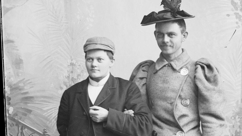 Høeg and her brother Karl pose in the studio in gender-nonconforming dress. - Preus Museum--Norwegian Museum of Photography