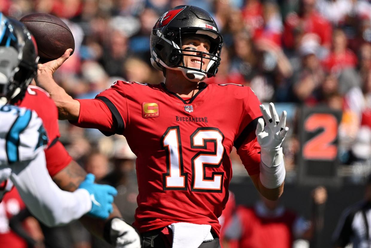 CHARLOTTE, NORTH CAROLINA - OCTOBER 23: Tom Brady #12 of the Tampa Bay Buccaneers passes the ball in the first quarter against the Carolina Panthers at Bank of America Stadium on October 23, 2022 in Charlotte, North Carolina. (Photo by Grant Halverson/Getty Images)