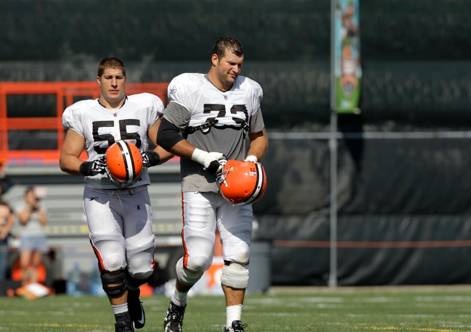 Browns center Alex Mack (55) and offensive tackle Joe Thomas (73) walk onto the field during practice Aug. 19, 2010.