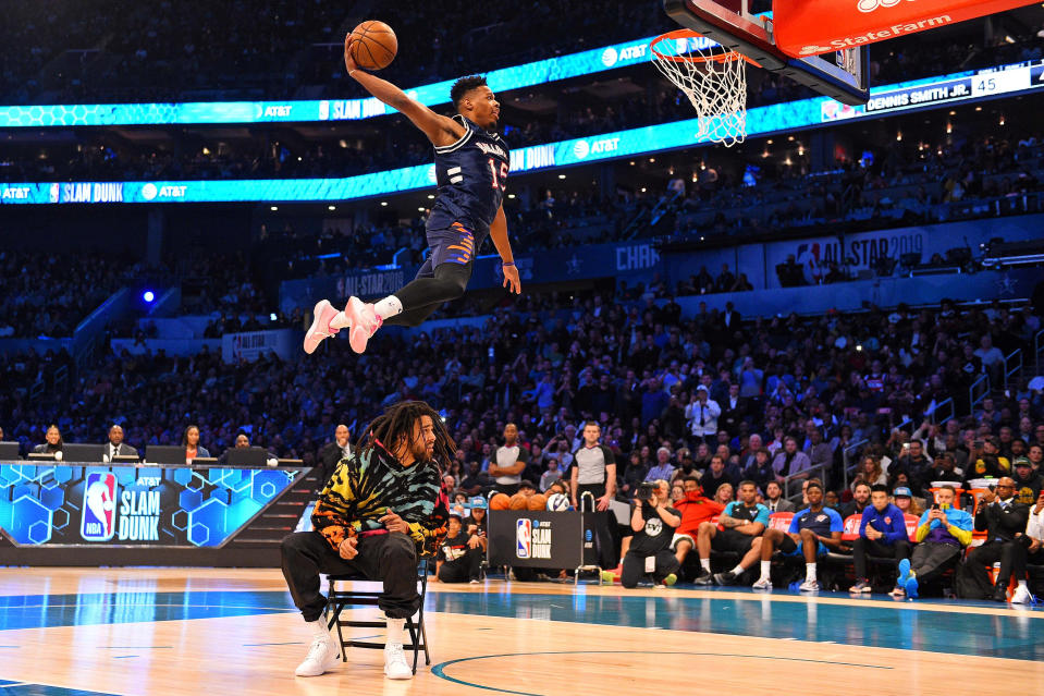 9Feb 16, 2019; Charlotte, NC, USA; New York Knicks forward Dennis Smith Jr dunks over Recording artist J Cole in the Slam Dunk Contest during the NBA All-Star Saturday Night at Spectrum Center. Mandatory Credit: Bob Donnan-USA TODAY Sports TPX IMAGES OF THE DAY