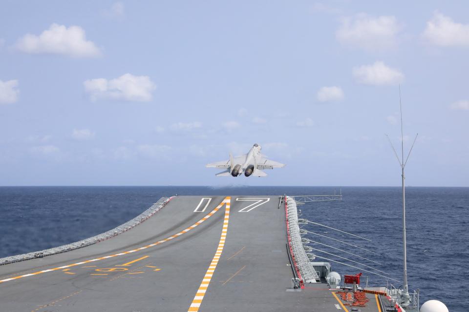 A J-15 fighter takes off from the Shandong aircraft carrier