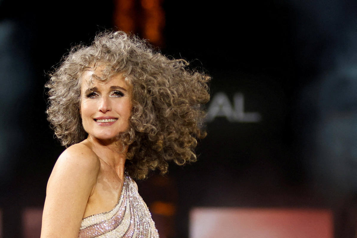 Andie MacDowell, 64, rocks her salt-and-pepper hair on the runway at Paris Fashion Week - Yahoo Life