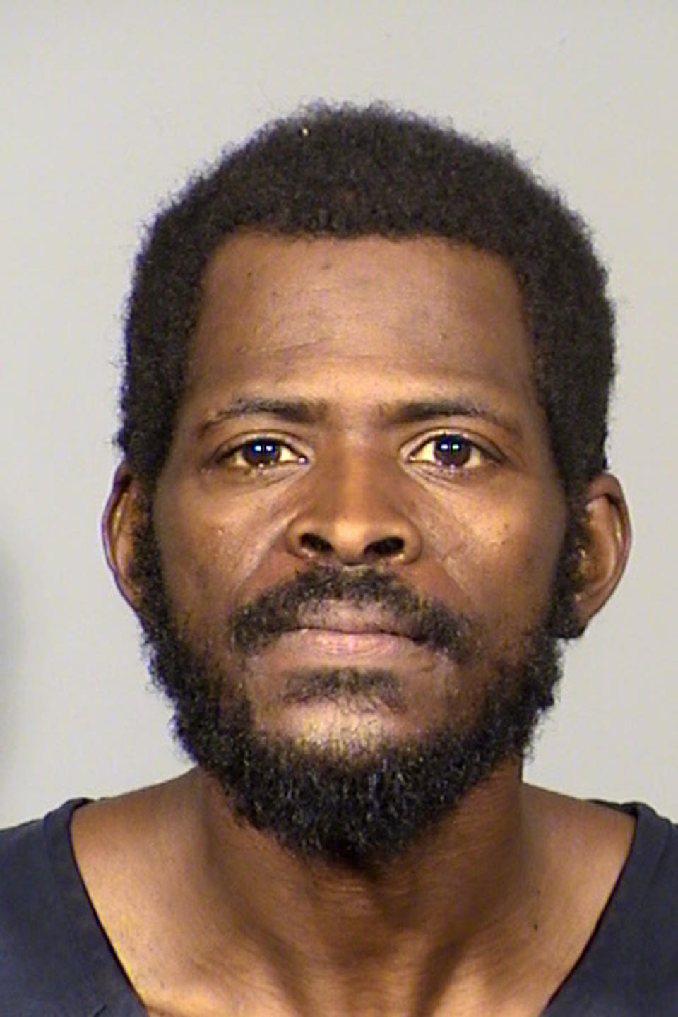 This undated photo provided by the Las Vegas Metropolitan Police Department shows Clinton Taylor, 36, of Las Vegas, following his arrest Thursday, Aug. 29, 2019. Taylor is accused of bludgeoning a woman to death with a sledgehammer while her 911 call from a Las Vegas laundromat went dead. Police say they don't believe the woman knew Taylor. (Las Vegas Metropolitan Police Department via AP)