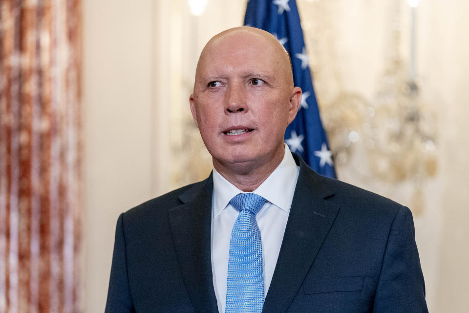 FILE - Australian Minister of Defense Peter Dutton, poses for a group photograph with Australian Foreign Minister Marise Payne, Secretary of State Antony Blinken, and Defense Secretary Lloyd Austin at the State Department in Washington on Sept. 16, 2021. Dutton said Friday, May 13, 2022, that a Chinese warship with spying capabilities had been hugging the western coastline in what amounted to an "aggressive act." (AP Photo/Andrew Harnik, Pool, File)