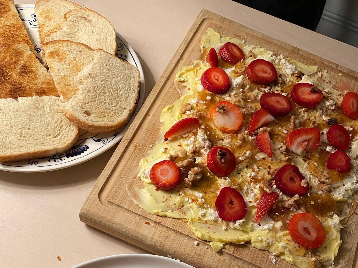 A picture of a butter board and bread