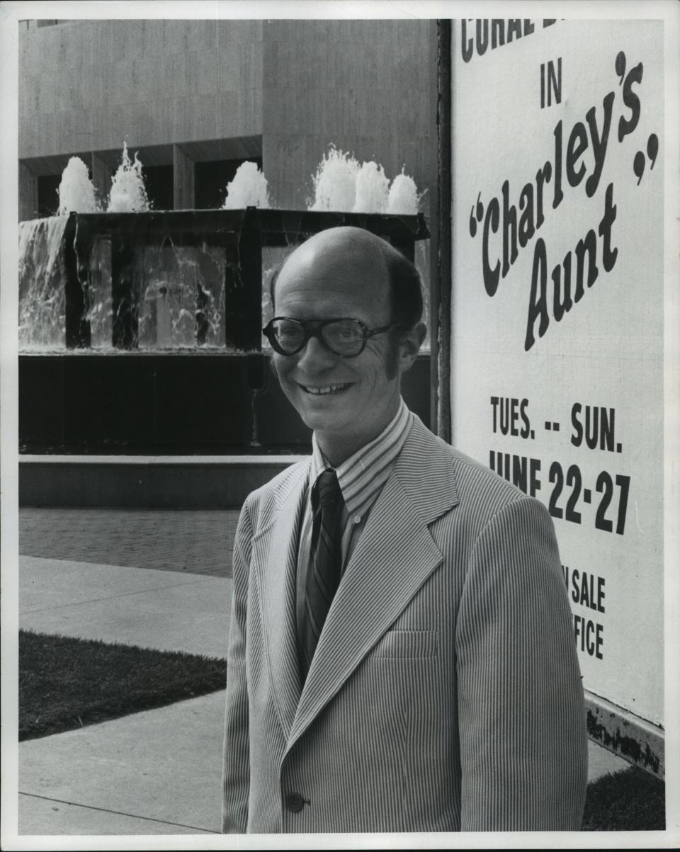 Mike Drew, shown in a 1976 photo outside the Marcus Performing Arts Center, reviewed everything from theater to jazz before covering Milwaukee broadcasting full time.
