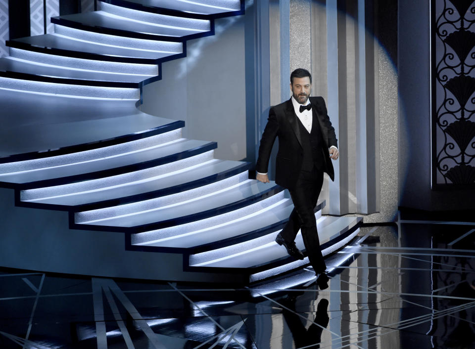 FILE - Host Jimmy Kimmel walks on stage at the Oscars on Feb. 26, 2017, in Los Angeles. Kimmel turns 53 on Nov. 13. (Photo by Chris Pizzello/Invision/AP, File)