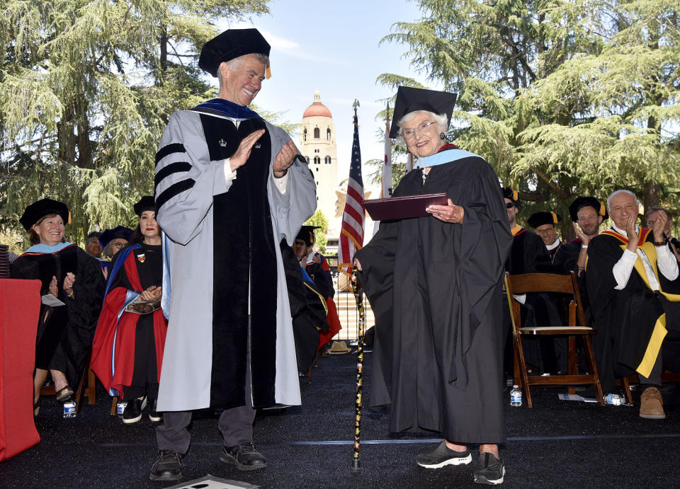 Virginia Hislop accepting her diploma for her master of arts in education at the GSE’s 2024 commencement ceremony from Dean Dan Schwartz. (Charles Russo)