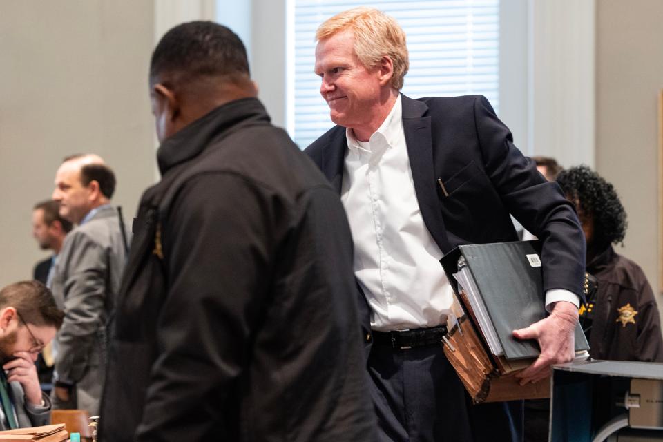 Alex Murdaugh smiles to his family in the audience as he returns for the afternoon session of his trial for murder at the Colleton County Courthouse on Tuesday, February 7, 2023. Joshua Boucher/The State/Pool