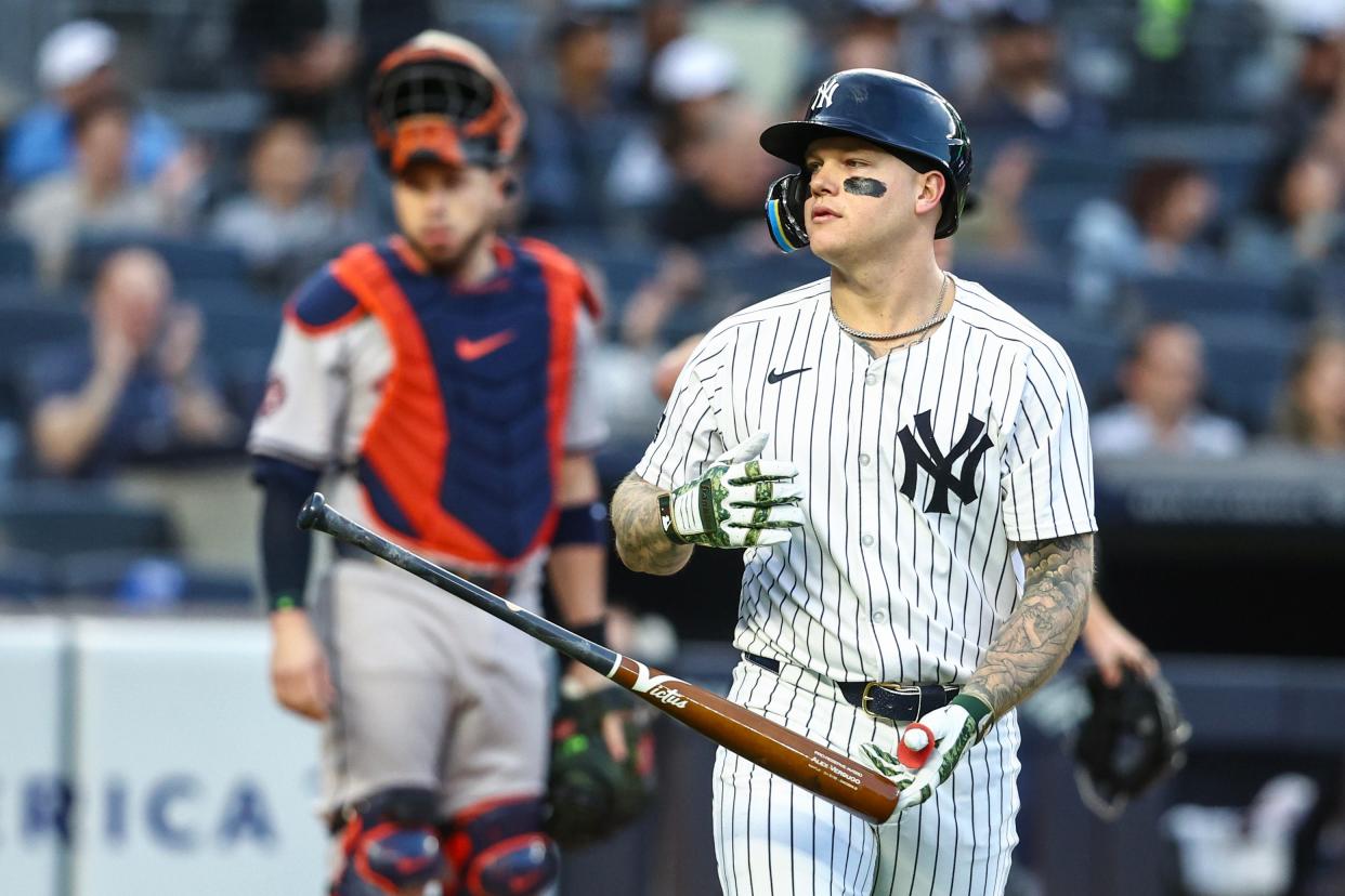May 7, 2024; Bronx, New York, USA; New York Yankees left fielder Alex Verdugo (24) tosses his bat after hitting a three run home run in the first inning against the Houston Astros at Yankee Stadium. Mandatory Credit: Wendell Cruz-USA TODAY Sports