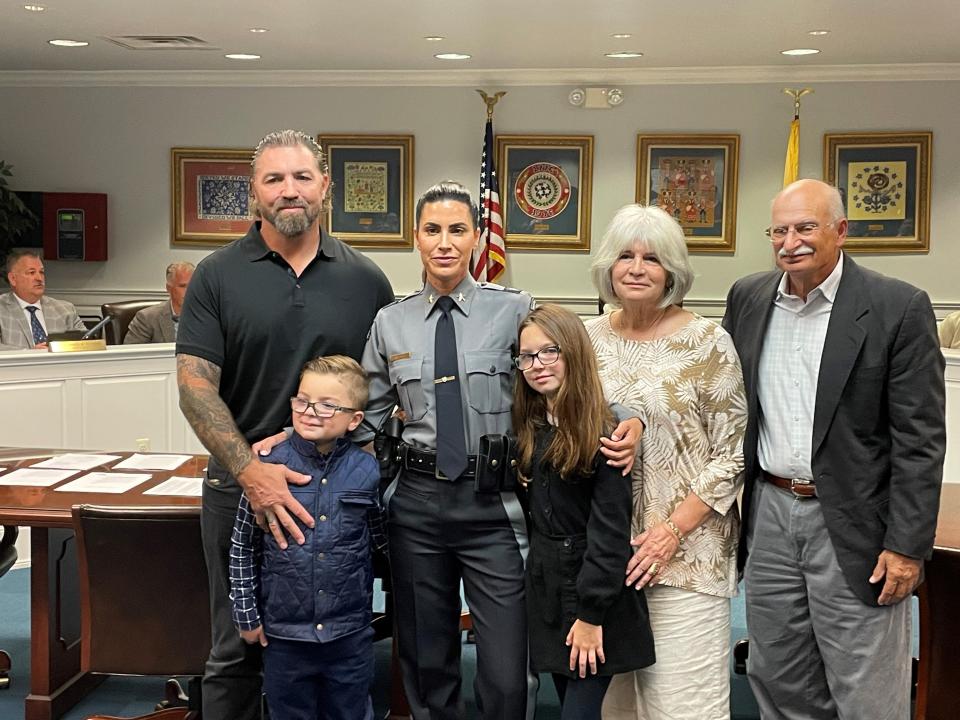 Marlowe Botti was sworn in as the new police chief at West Long Branch. Botti is the first female police chief in the borough's 115-year history. She is seen here standing with her family.