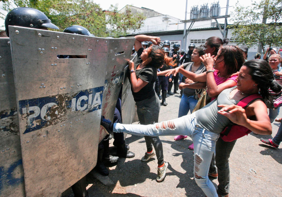 Families bereft after Venezuelan prison riot kills dozens