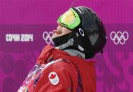 Third-placed Canada's Kim Lamarre reacts after the women's freestyle skiing slopestyle finals at the 2014 Sochi Winter Olympic Games in Rosa Khutor February 11, 2014. REUTERS/Mike Blake