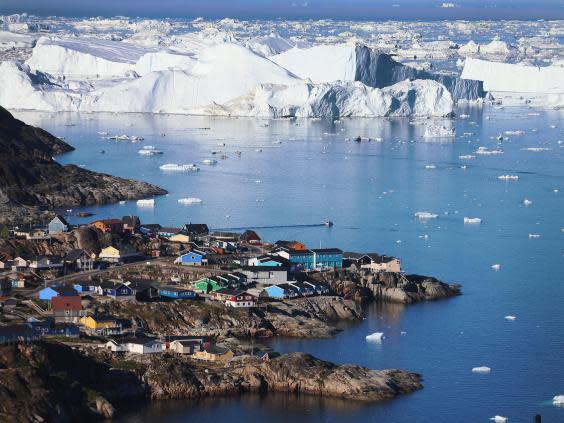 Greenland's biggest glacier grows but scientists warn against climate change optimism