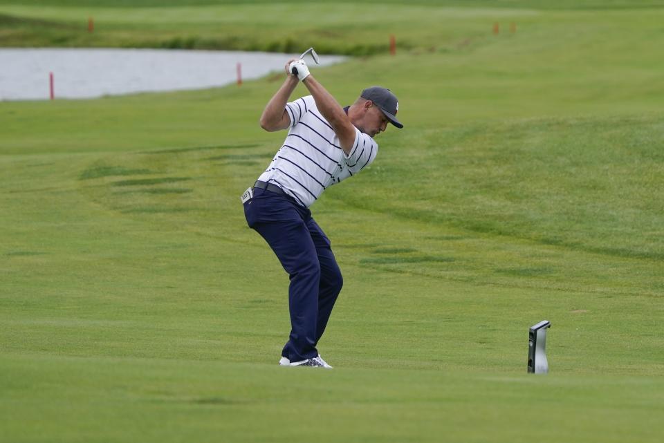 Team USA's Bryson DeChambeau hits on the fifth hole during a practice day at the Ryder Cup at the Whistling Straits Golf Course Tuesday, Sept. 21, 2021, in Sheboygan, Wis. (AP Photo/Charlie Neibergall)