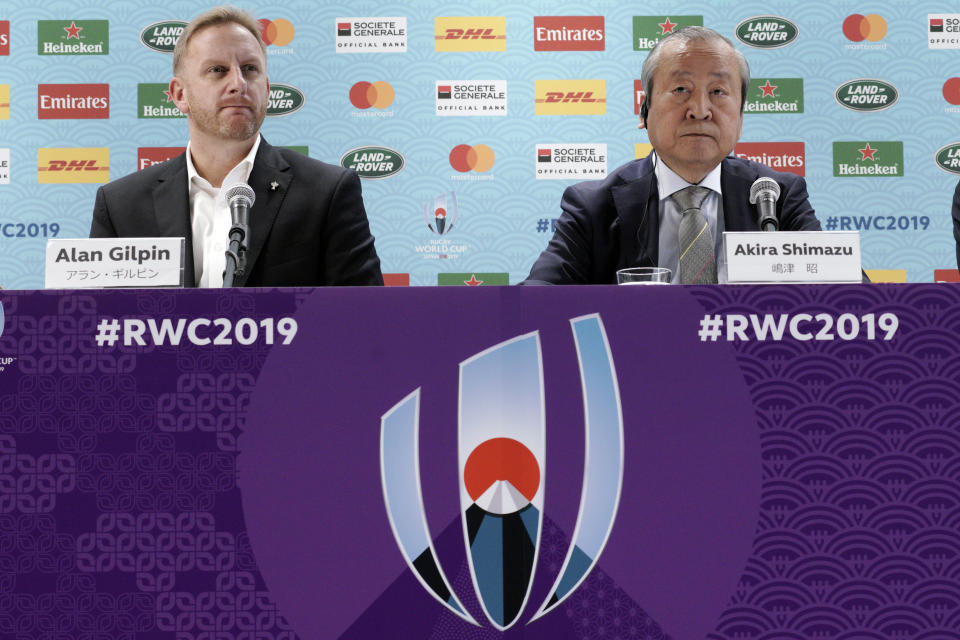 Alan Gilpin, left, tournament director for the 2019 Rugby World Cup and Japan Rugby 2019 CEO Akira Shimazu, right, attend during a press briefing on update relating to the anticipated impact of Typhoon Hagibis on the final round Rugby World Cup 2019 pool matches this weekend Thursday, Oct. 10, 2019, in Tokyo. (AP Photo/Eugene Hoshiko)