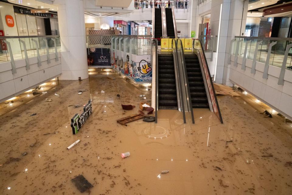 Hong Kong swamped by record rain flooding roads and subway stations