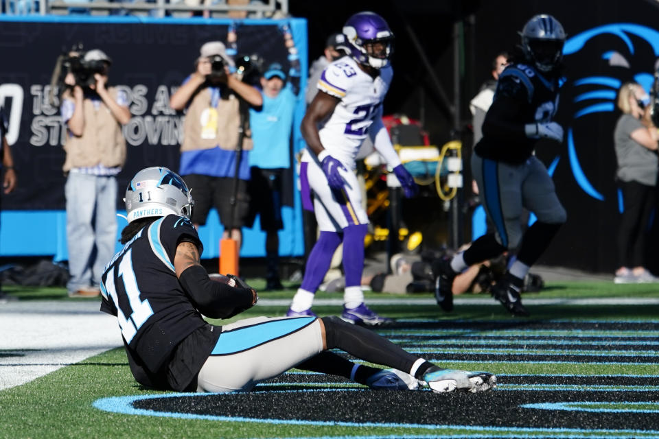 Carolina Panthers wide receiver Robby Anderson (11) makes a touchdown catch against the Minnesota Vikings during the second half of an NFL football game, Sunday, Oct. 17, 2021, in Charlotte, N.C. (AP Photo/Jacob Kupferman)