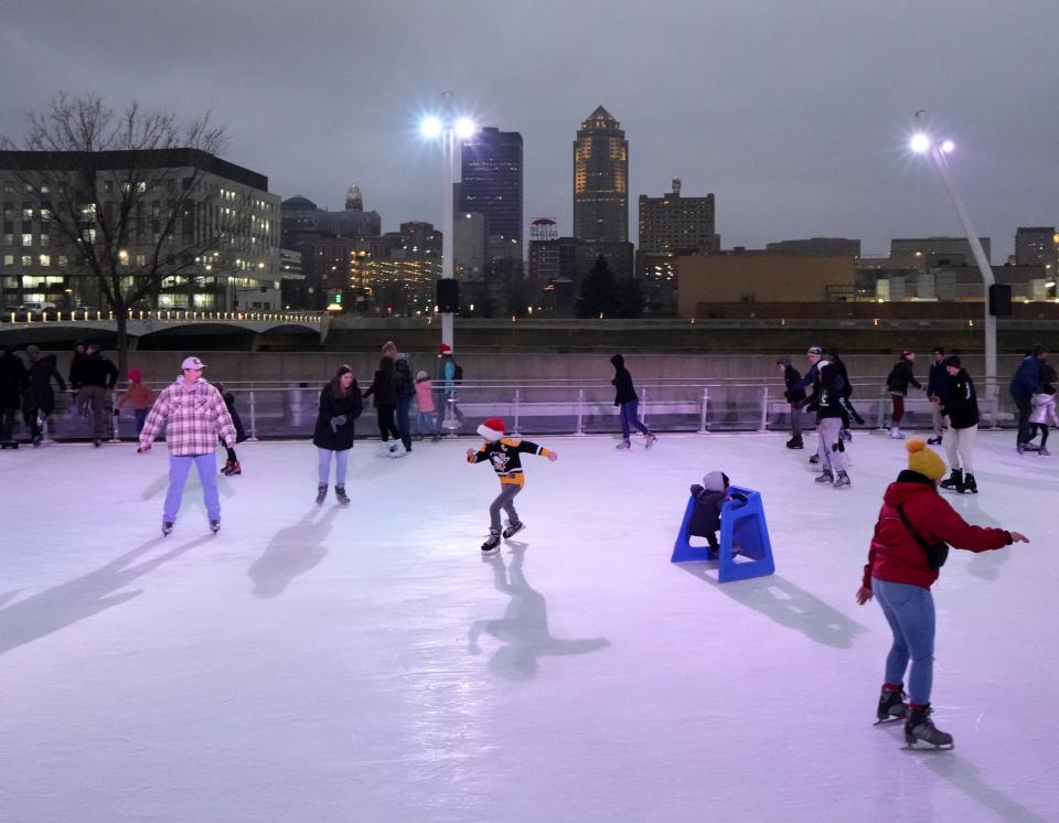 Ice skaters enjoy some fun at the Brenton Skating Plaza in Des Moines.