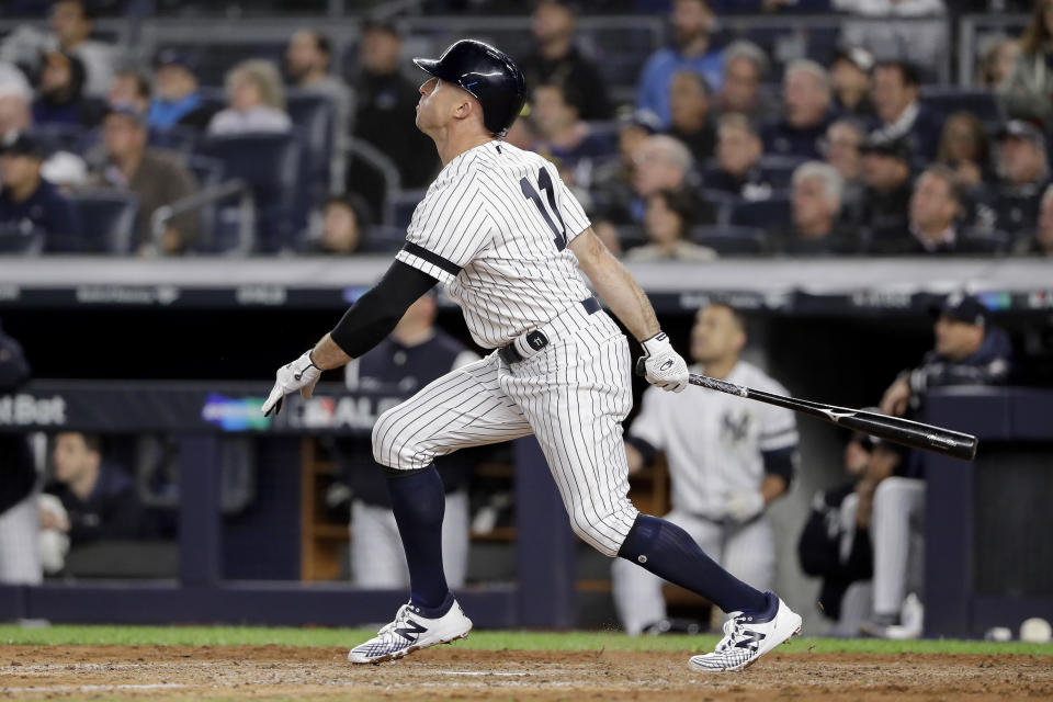 New York Yankees left fielder Brett Gardner (11) watches his solo home run sail into the right field seats during the sixth inning of Game 1 of an American League Division Series baseball game against the Minnesota Twins, Friday, Oct. 4, 2019, in New York. (AP Photo/Frank Franklin II)