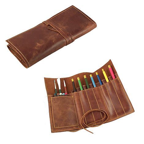 <p><strong>Rustic Ridge Leather</strong></p><p>amazon.com</p><p><strong>$25.97</strong></p><p><a href="https://www.amazon.com/dp/B00Q7B69AG?tag=syn-yahoo-20&ascsubtag=%5Bartid%7C10055.g.28414150%5Bsrc%7Cyahoo-us" rel="nofollow noopener" target="_blank" data-ylk="slk:Shop Now" class="link ">Shop Now</a></p><p>If you have an artist in your family, show him you take his craft seriously with this grown-up pencil roll, <strong>made of genuine leather.</strong> And, since it comes empty, you might want to get him some new <a href="https://www.amazon.com/Creativity-Kids-Castell-Classic-Colored/dp/B01MCTOLRY?tag=syn-yahoo-20&ascsubtag=%5Bartid%7C10055.g.28414150%5Bsrc%7Cyahoo-us" rel="nofollow noopener" target="_blank" data-ylk="slk:colored pencils" class="link ">colored pencils</a>, <a href="https://www.amazon.com/Brushes-Miniature-Canvases-Synthetic-Bristles/dp/B01DYV725W?tag=syn-yahoo-20&ascsubtag=%5Bartid%7C10055.g.28414150%5Bsrc%7Cyahoo-us" rel="nofollow noopener" target="_blank" data-ylk="slk:paintbrushes" class="link ">paintbrushes</a> or <a href="https://www.amazon.com/Paint-Painting-Ceramic-Acrylic-Markers/dp/B07485T22B?tag=syn-yahoo-20&ascsubtag=%5Bartid%7C10055.g.28414150%5Bsrc%7Cyahoo-us" rel="nofollow noopener" target="_blank" data-ylk="slk:paint pens" class="link ">paint pens</a> to go with it.</p>