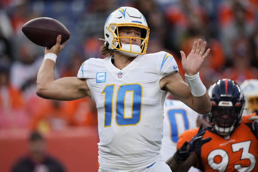 Los Angeles Chargers quarterback Justin Herbert (10) throws.