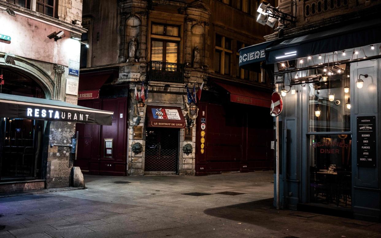 The deserted Merciere Street in Lyon - JEFF PACHOUD / AFP