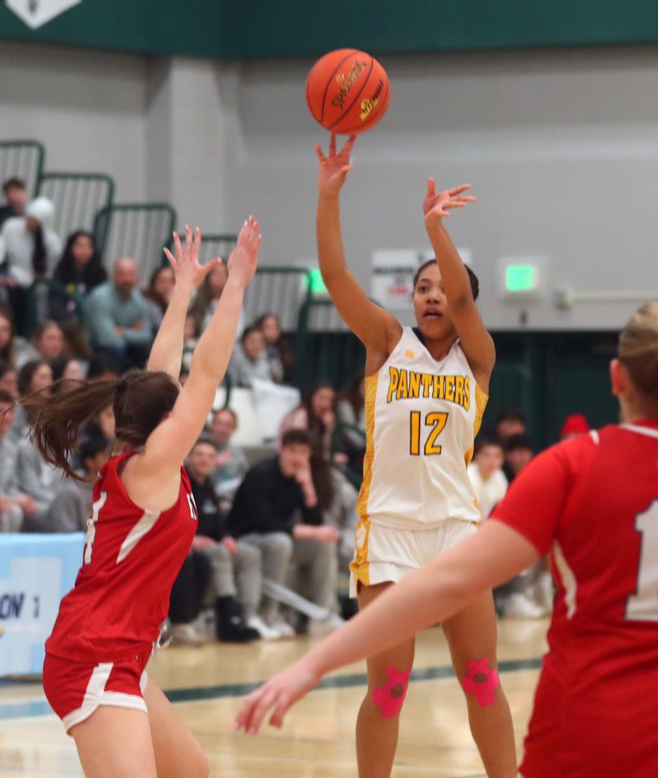 Panas' Cadence Nicholas (12) puts up a shot against red Hook during the girls Class A regional semifinal at Yorktown High School March 5, 2024. Walter Panas won the game 63-30.