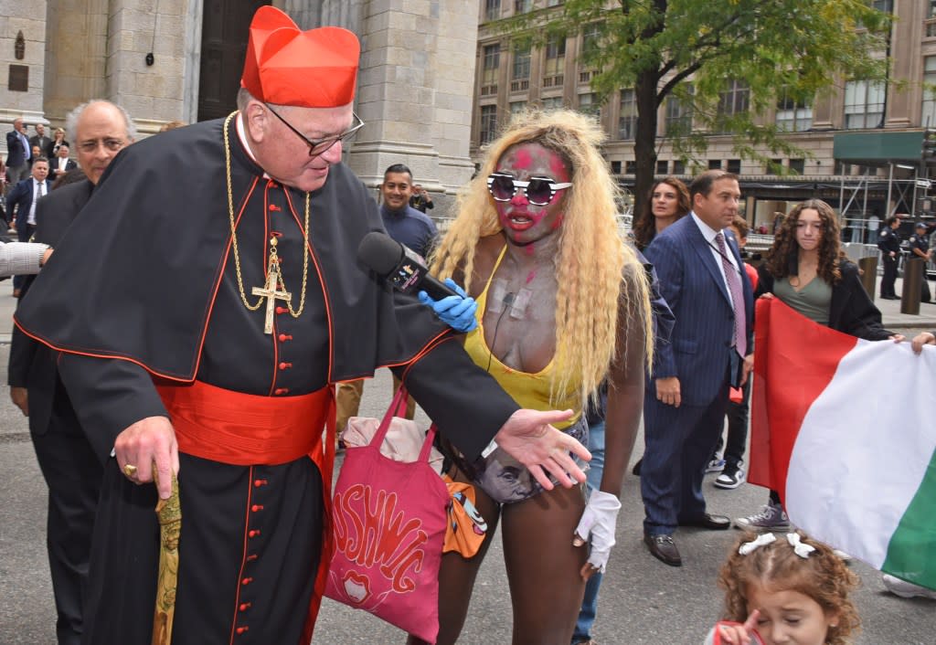 Crackhead Barney tries to interview Cardinal Timothy Dolan in 2021. Gregory P. Mango
