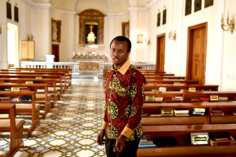 Deogratias arrives in the chapel of the International Ecclesiastical College Sedes Sapientiae to pray after the Clericus Cup quarter-final