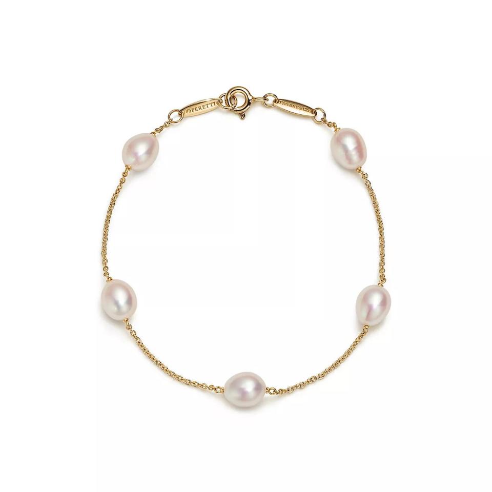 <p><a href="https://www.tiffany.com/jewelry/bracelets/elsa-peretti-pearls-by-the-yard-bracelet-GRP09640/elsa-peretti-pearls-by-the-yard-bracelet-60764042/?omcid=ppc_google_TIFFANY_WJ_USA_NOBRID_FJW_LOW_OGOING_EC_PEMA_GPMA_CRD_USD_N__&mkwid=%7Cpcrid%7C%7Cpkw%7C%7Cpmt%7C%7Cpdv%7Cc%7Cmtid%7C744dpc50313%7Cslid%7C%7Cproductid%7C%7Ctargetids%7C%7Cgroupid%7C%7C&gad_source=1&gclid=CjwKCAiA-vOsBhAAEiwAIWR0TXb-bWhjNwm2PjwFjJdTj88JWpPg6jYoyqIj-pPSrWl5z5JTooVIKxoCTeMQAvD_BwE&gclsrc=aw.ds" rel="nofollow noopener" target="_blank" data-ylk="slk:Shop Now;elm:context_link;itc:0;sec:content-canvas" class="link ">Shop Now</a></p><p>Elsa Peretti Pearls by the Yard Bracelet</p><p>tiffany.com</p><p>$750.00</p>