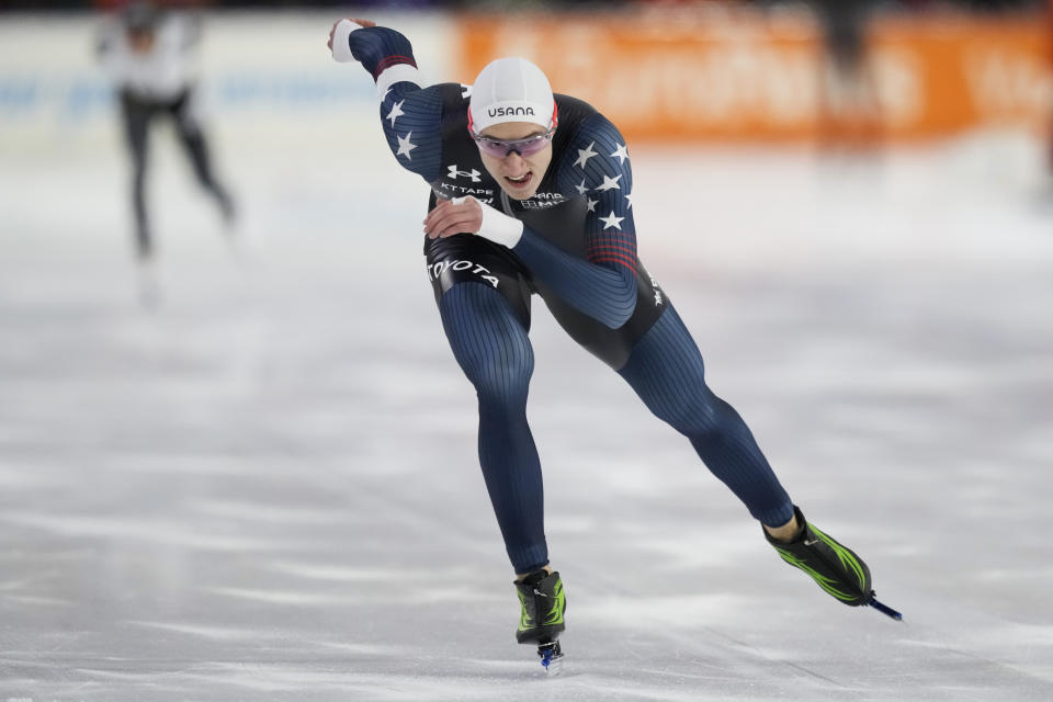 Jordan Stolz of the U.S. competes against Kazuya Yamada of Japan, left, to win his third gold medal on the 1500m Men event of the Speedskating Single Distance World Championships at Thialf ice arena Heerenveen, Netherlands, Sunday, March 5, 2023. (AP Photo/Peter Dejong)