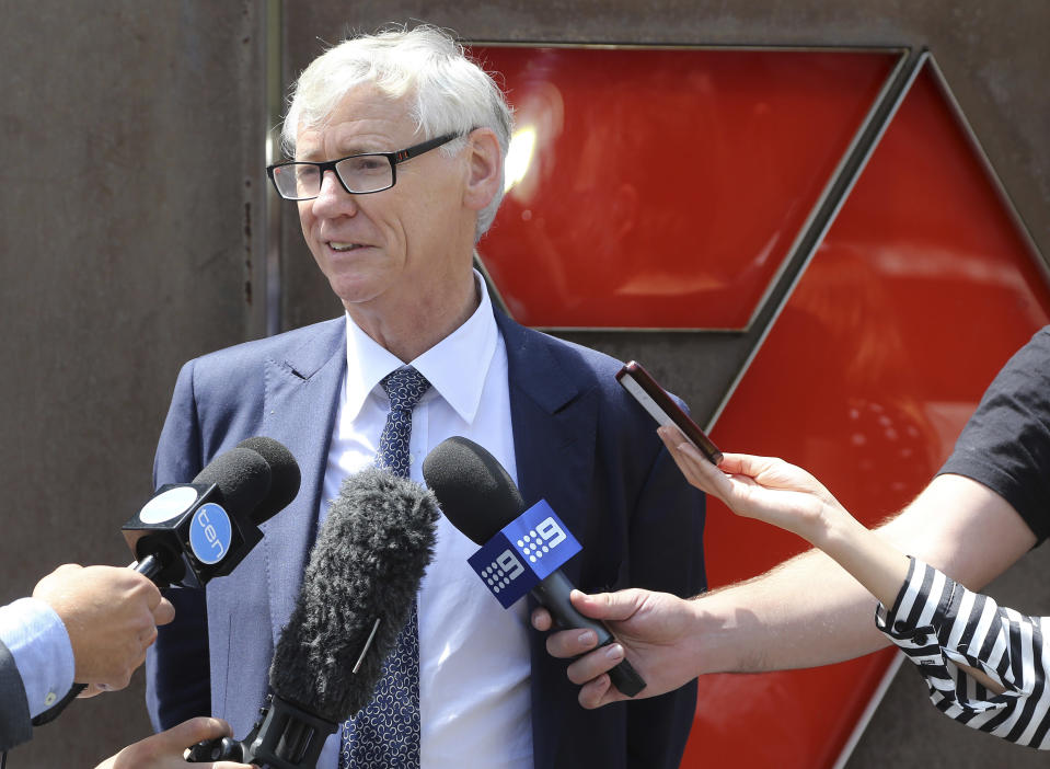 Chief Legal and Commercial Director of Seven Network Bruce Ian McWilliam speaks to the media after Australian Federal Police raided their headquarters in Sydney, Australia, Tuesday, Feb. 18, 2014. Police seeking to prevent a convicted drug trafficker from profiting from her life story have raided the Sydney headquarters of the television network that is negotiating an exclusive interview deal.(AP Photo/Rob Griffith)