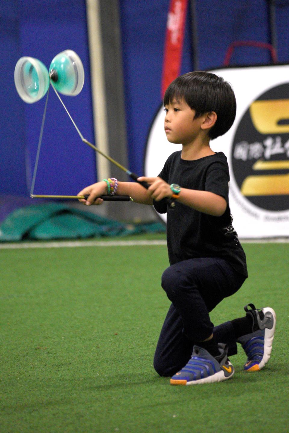 Chase Yang, 6, from California performs in his first diabolo competition on Saturday, August 5, 2023 at The Fields Sports Complex in East Brunswick, New Jersey.