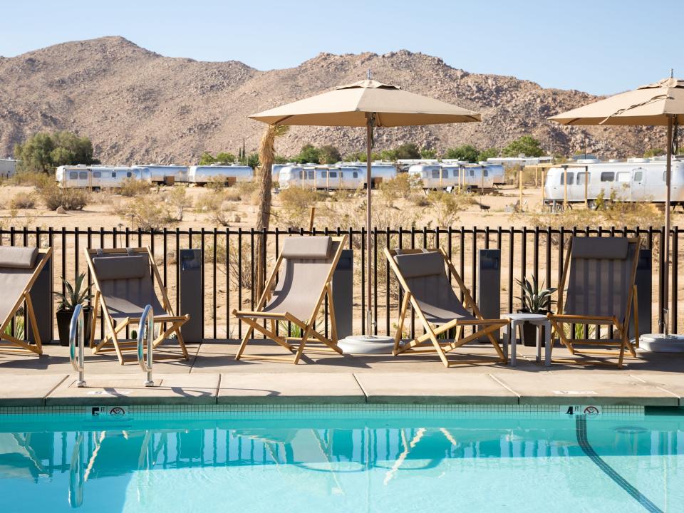 Lounge chairs by the pool.