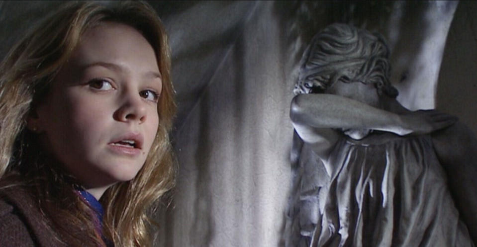 Carey Mulligan with a weeping angel in the 2007 Doctor Who episode Blink. (BBC/Alamy)