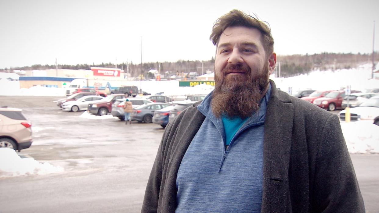 Graham Alexander was relieved to be able to get groceries in Sydney, N.S., on Wednesday after seeing pictures of empty shelves on social media the day before. (Tom Ayers/CBC - image credit)