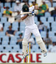 South Africa's Stephen Cook ducks a delivery during the fourth cricket test match against England in Centurion, South Africa, January 22, 2016. REUTERS/Siphiwe Sibeko