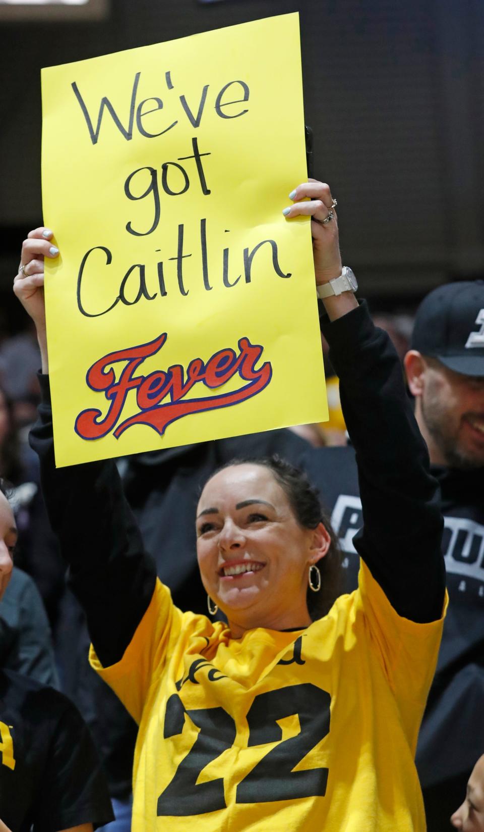 A fan holds a sign for the Indianapolis Fever during the NCAA women’s basketball game between the Purdue Boilermakers and the Iowa Hawkeyes, Wednesday, Jan. 10, 2024, at Mackey Arena in West Lafayette, Ind. Iowa Hawkeyes won 96-71.