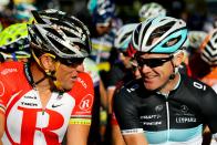 Lance Armstrong of the US (L) talks with Stuart O'Grady of Australia as they prepare to take part in the 51 km Cancer Council Classic cycling race, part of the 2011 Tour Down Under, in Adelaide on January 16, 2011. The Tour Down Under cycling event runs from January 16-23. IMAGE STRICTLY RESTRICTED TO EDITORIAL USE STRICTLY NO COMMERCIAL USE AFP PHOTO / MARK GUNTER (Photo credit should read Mark Gunter/AFP/Getty Images)