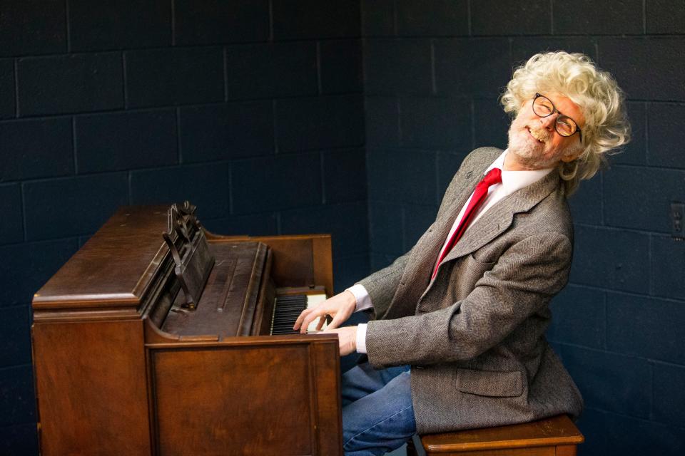 Cecil Eastman plays the piano during a dress rehearsal for "Beyond the Fringe," which will run Jan. 21-30, 2022, at The Acting Ensemble in Mishawaka.