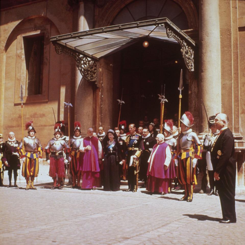 Queen Elizabeth II and Prince Philip leave the Vatican after visiting with the Pope in 1961.