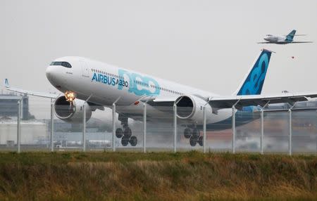 An Airbus A330neo aircraft lands during its maiden flight event in Colomiers near Toulouse, France, October 19, 2017. REUTERS/Regis Duvignau