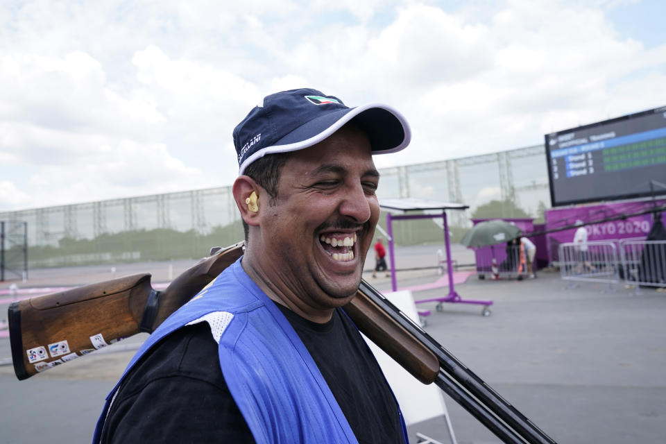 Talal Alrashidi, of Kuwait, smiles as he finishes practice at the Asaka Shooting Range ahead of the 2020 Summer Olympics, Friday, July 23, 2021, in Tokyo, Japan. (AP Photo/Alex Brandon)
