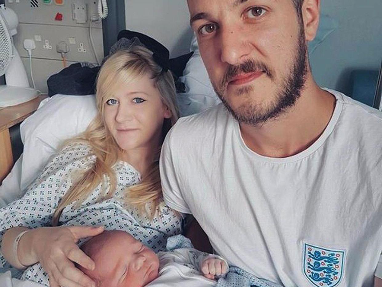 Chris Gard and Connie Yates with their son Charlie Gard: PA